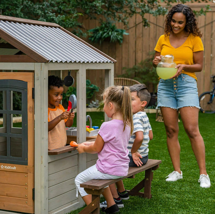 KidKraft Pioneer Cottage Wooden Playhouse with Doorbell and 13 Pieces